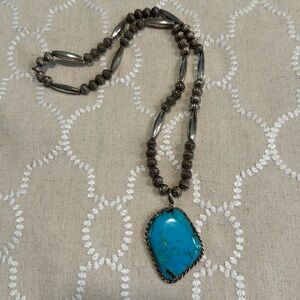 Genuine Southwest Indian Turquoise signed necklace. Silver beads.